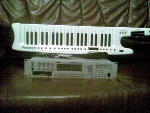 de vanzre keybord roland ax7  cu procesor korg triton rack